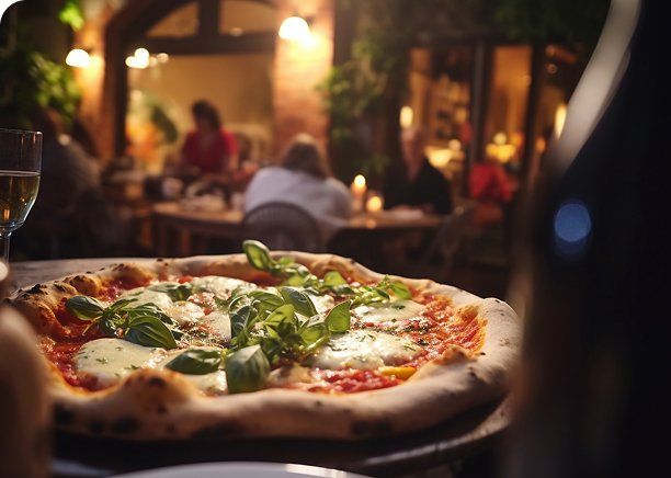 A pizza photographed from above on a pale stone surface.